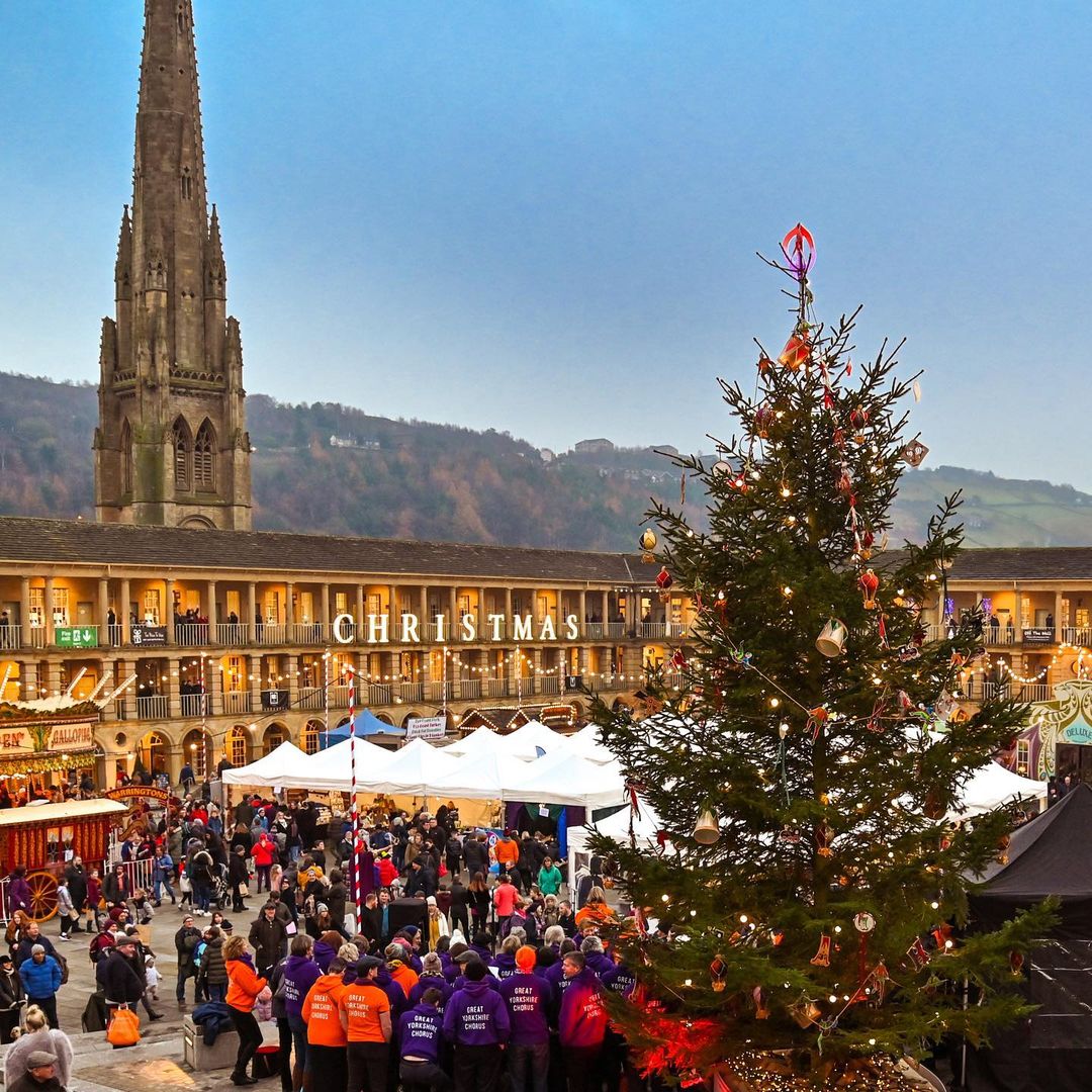 The Piece Hall Will Host Twinkling Christmas Markets, Festive Drinks & Rides This Xmas