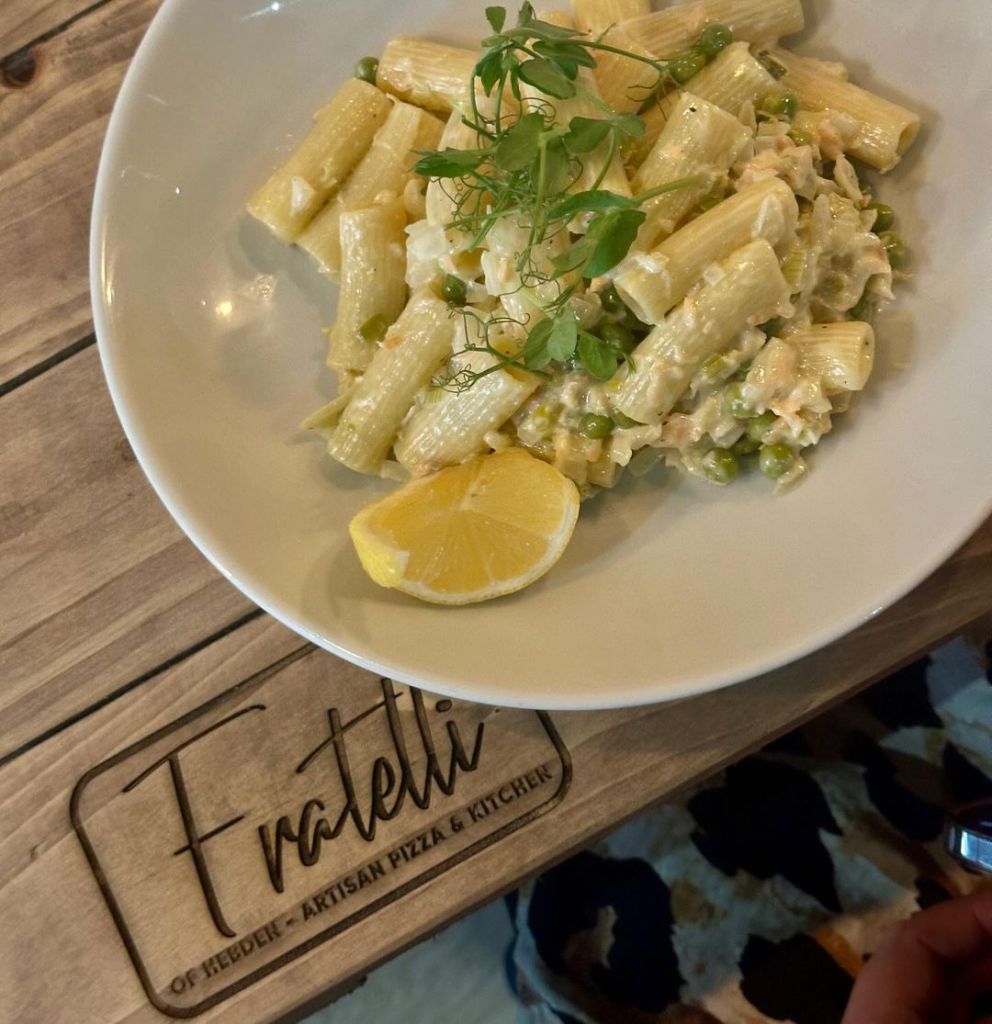 Rigatoni pasta served in a creamy sauce with lemon, presented in a bowl at Fratelli's of Hebden. 