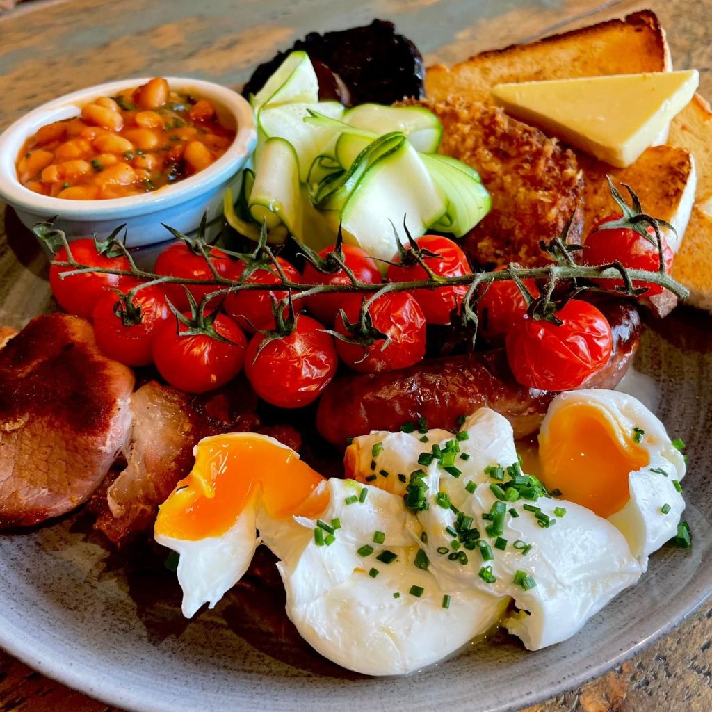 A close-up image of a full English breakfast served at York farm shop in Yorkshire. 