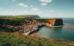The Unspoilt Coastal Village In Yorkshire That’s Home To Cliffside Cottages & Hidden Beach