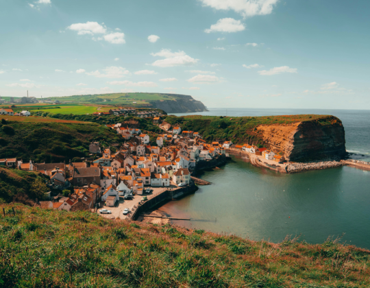 The Unspoilt Coastal Village In Yorkshire That’s Home To Cliffside Cottages & Hidden Beach