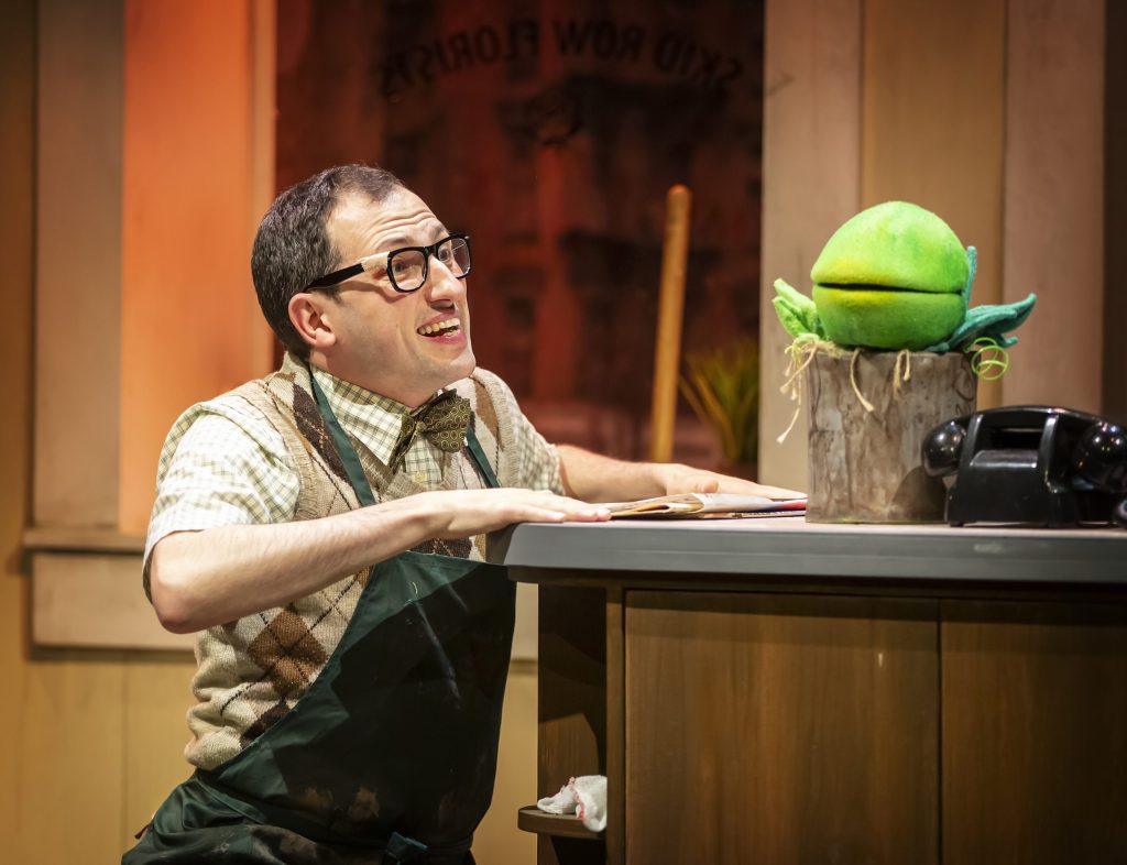 Seymour and Audrey Two on stage for Little Shop of Horrors.