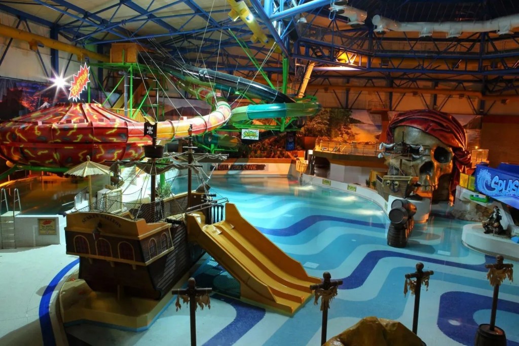 Inside Calypso Cove, Barnsley, a large pool with pirate-themed slides. 