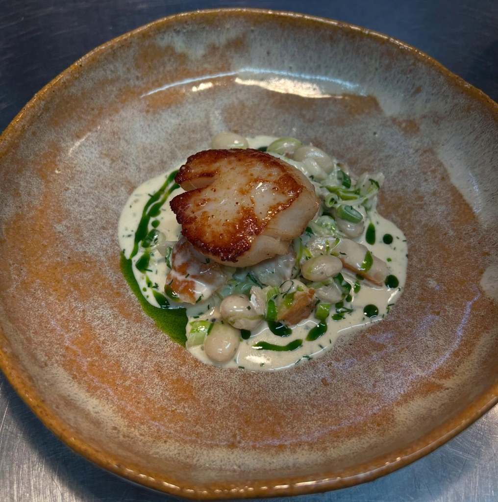 A fish dish served on a plate at Homestead Kitchen, Goathland. 