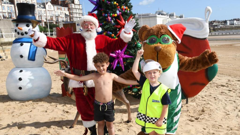 Children posing with Santa at Bridmas 