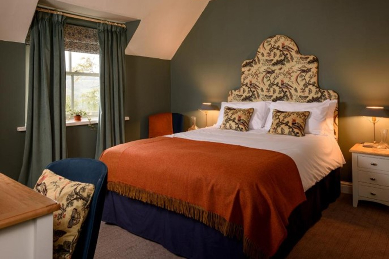 A stylish bedroom at The Owl Hawnby.
