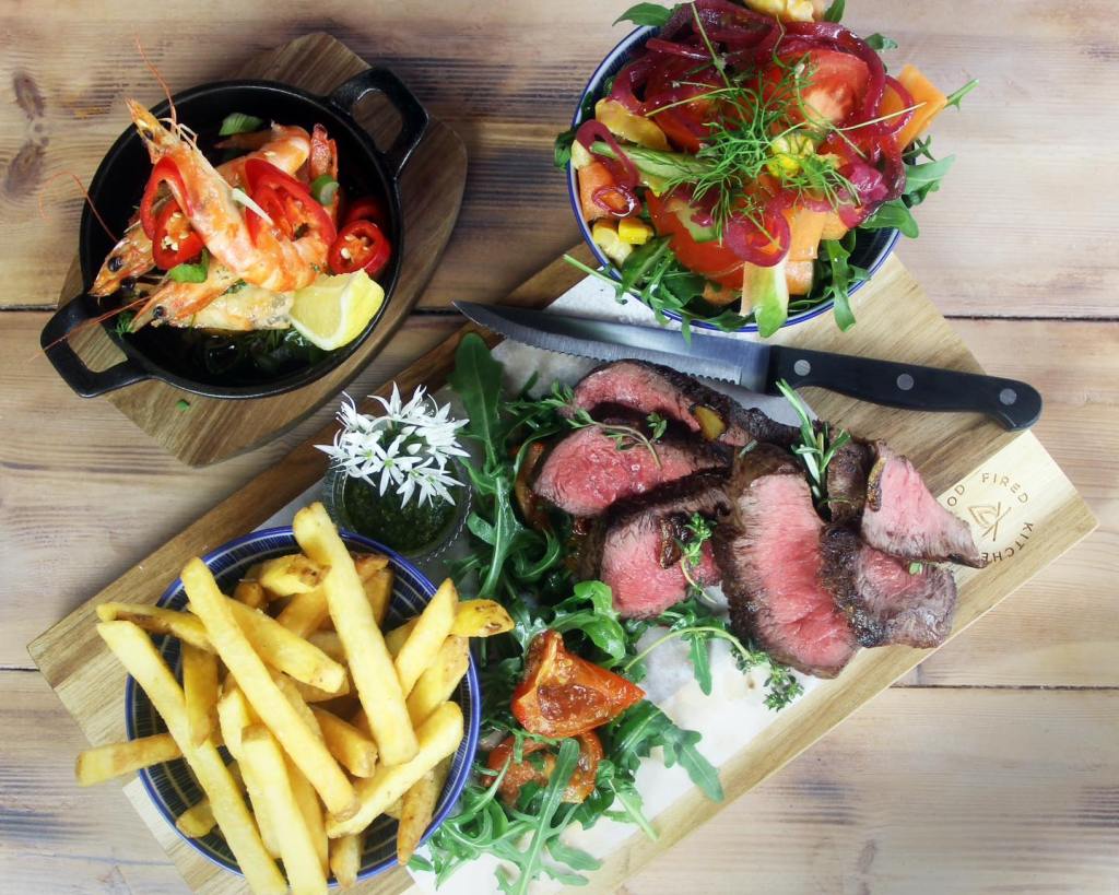 Steak served on a board at Embers in Scarborough.